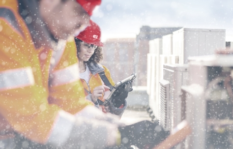 Maintenance team checking the units during winter